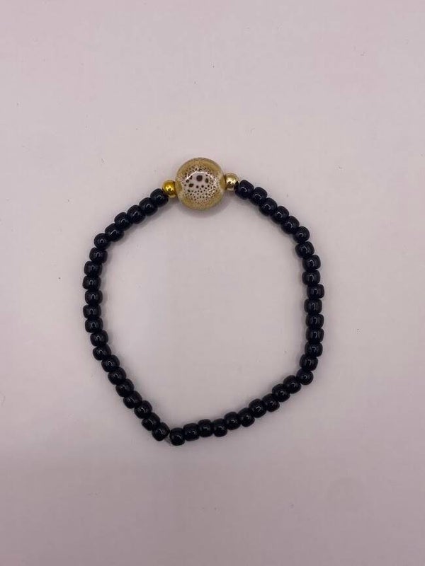 Armbandje zwart taupe