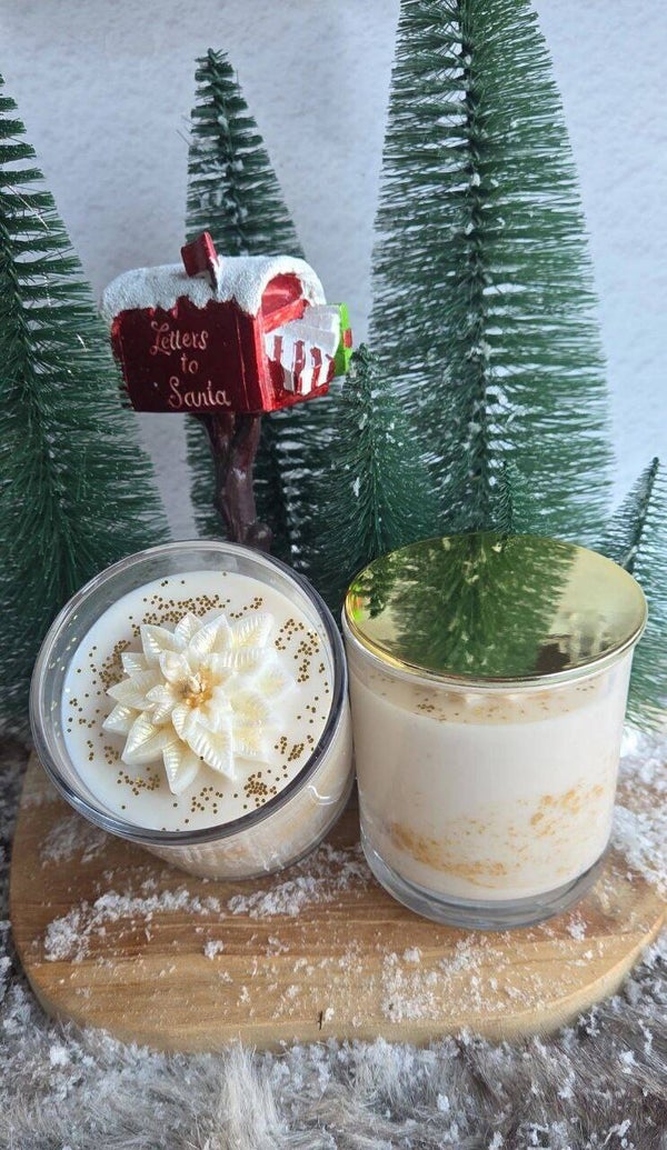 Handgemaakte kaars met kerstbloem