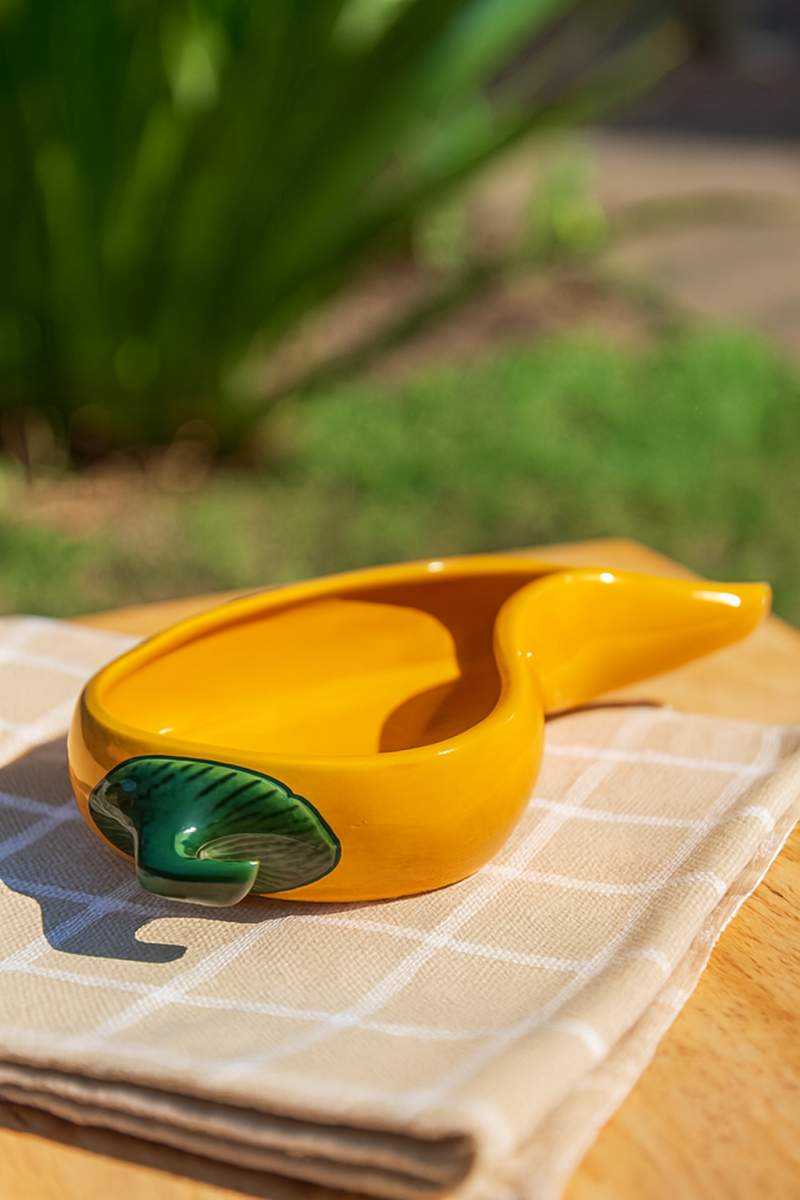 Quirky yellow chilli-shaped ceramic serving dish