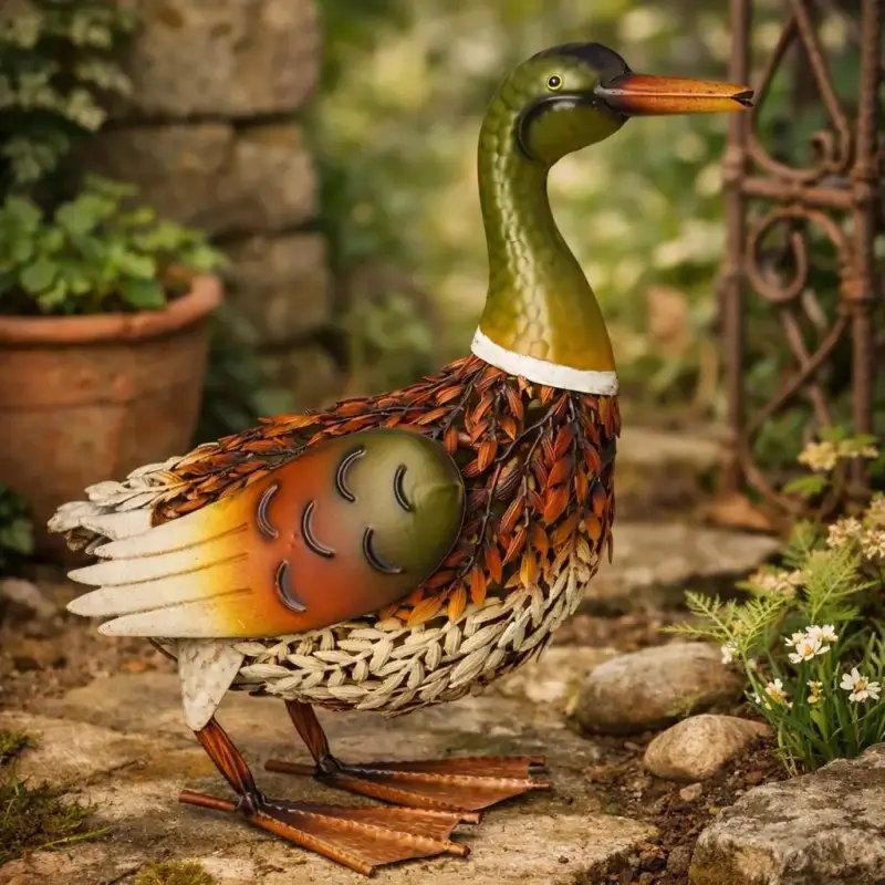 Quirky decorative metal duck ornament displayed in a garden
