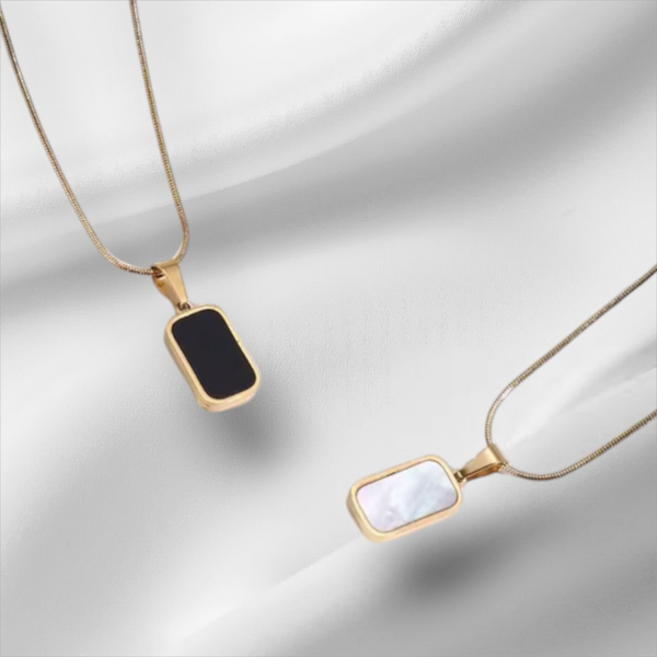 325L stainless steel necklace. White natural shell and double-sided black enamel.