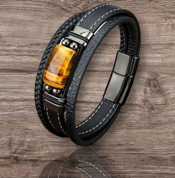 Bracelet with 1 tiger's eye stone. Black leather cord.