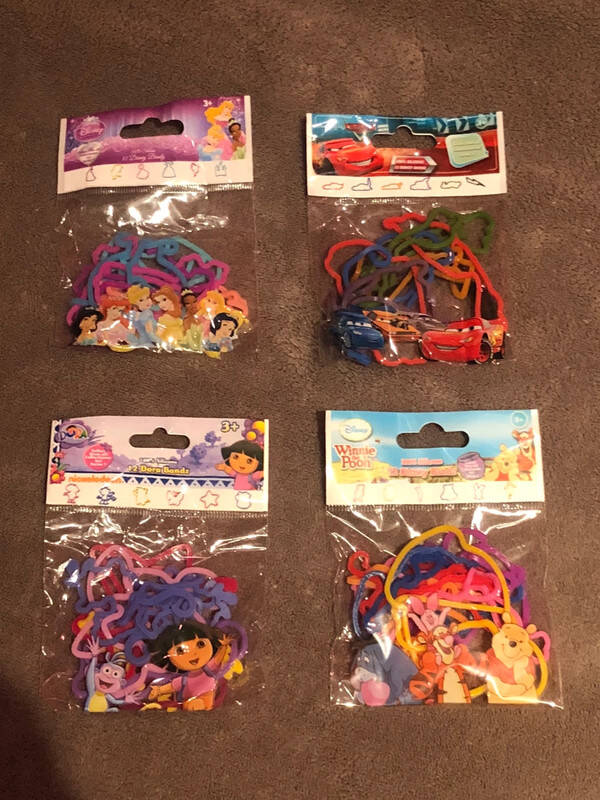 Lot de 4 sachets de 12 élastiques Disney - Bijoux & Accessoires