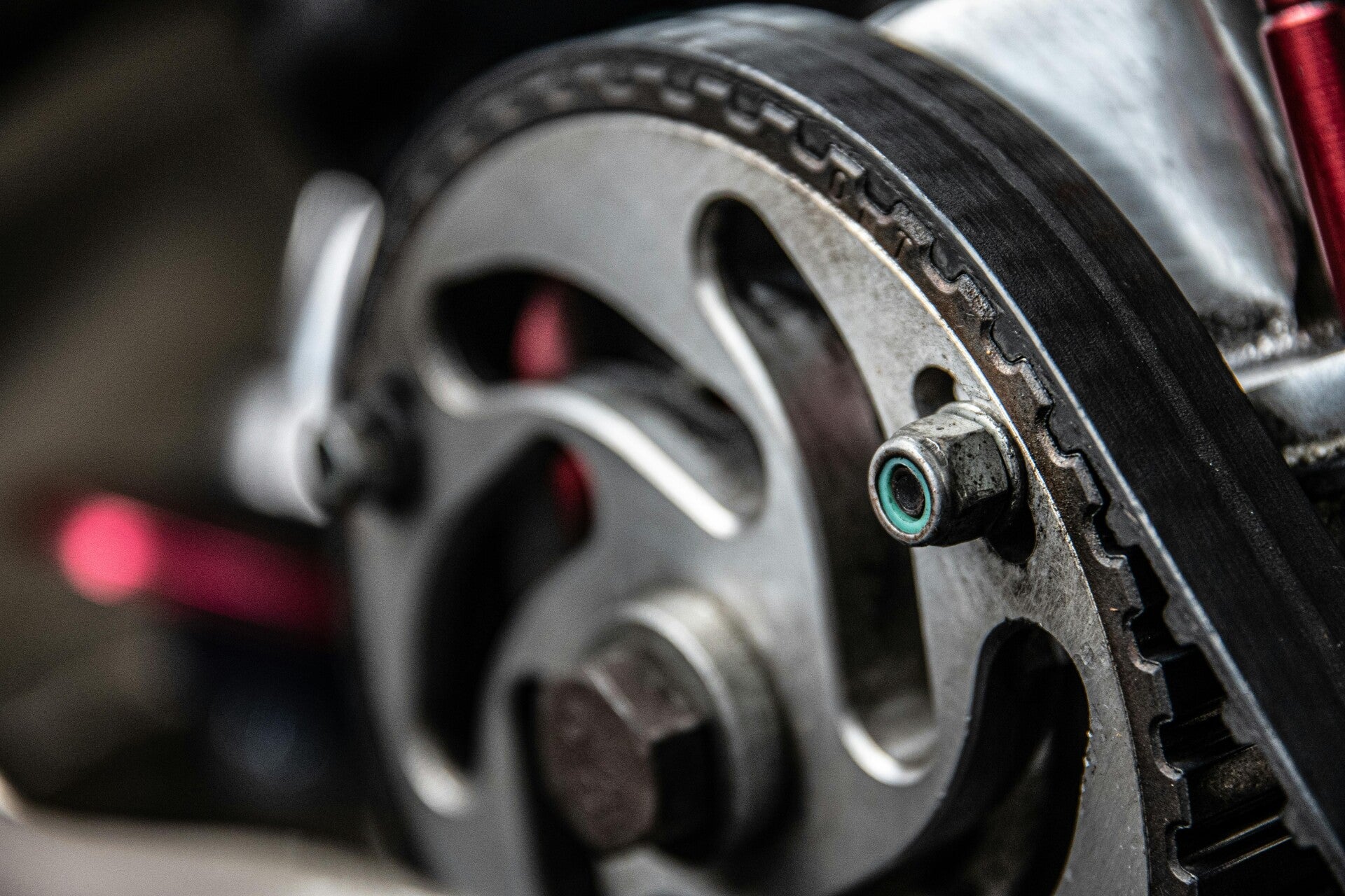 Close-up of industrial pulley belt and machinery component