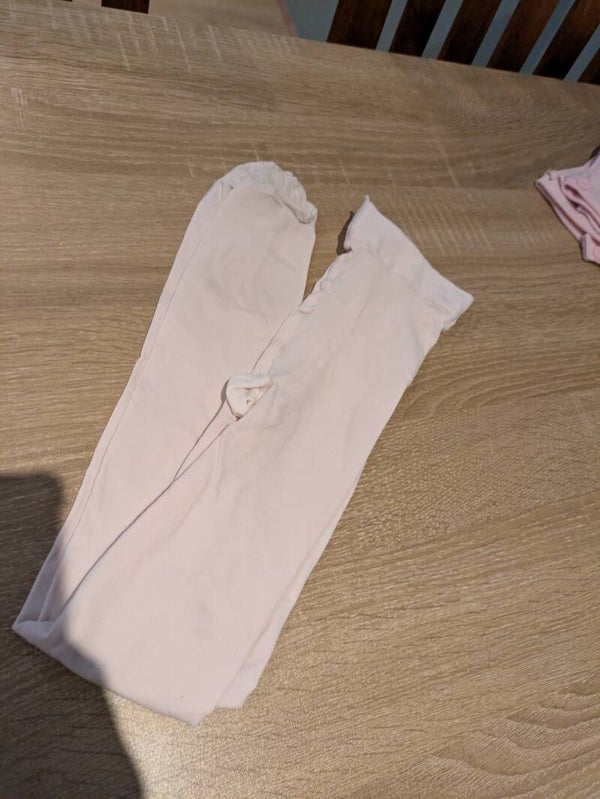 Roze Maillot met voetjes - Maat 122/128