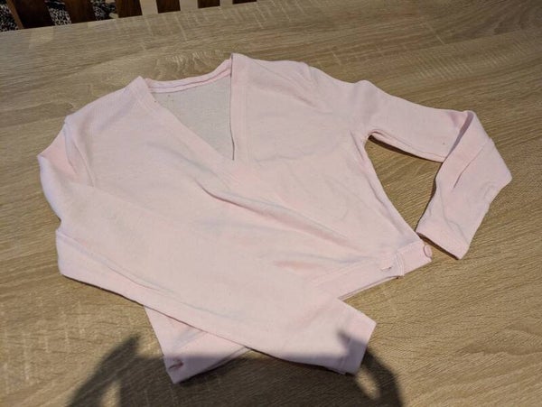 Roze balletvestje met knoop - maat 122/128