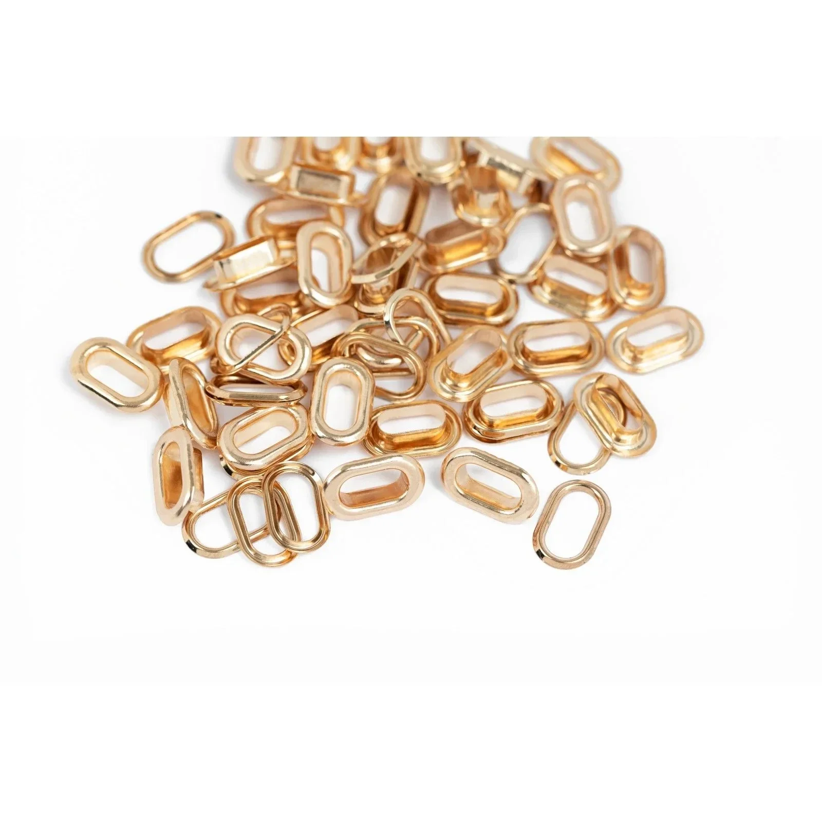 735143 - We R Makers • Crop-A-Dile Oval Eyelets Gold 50pcs