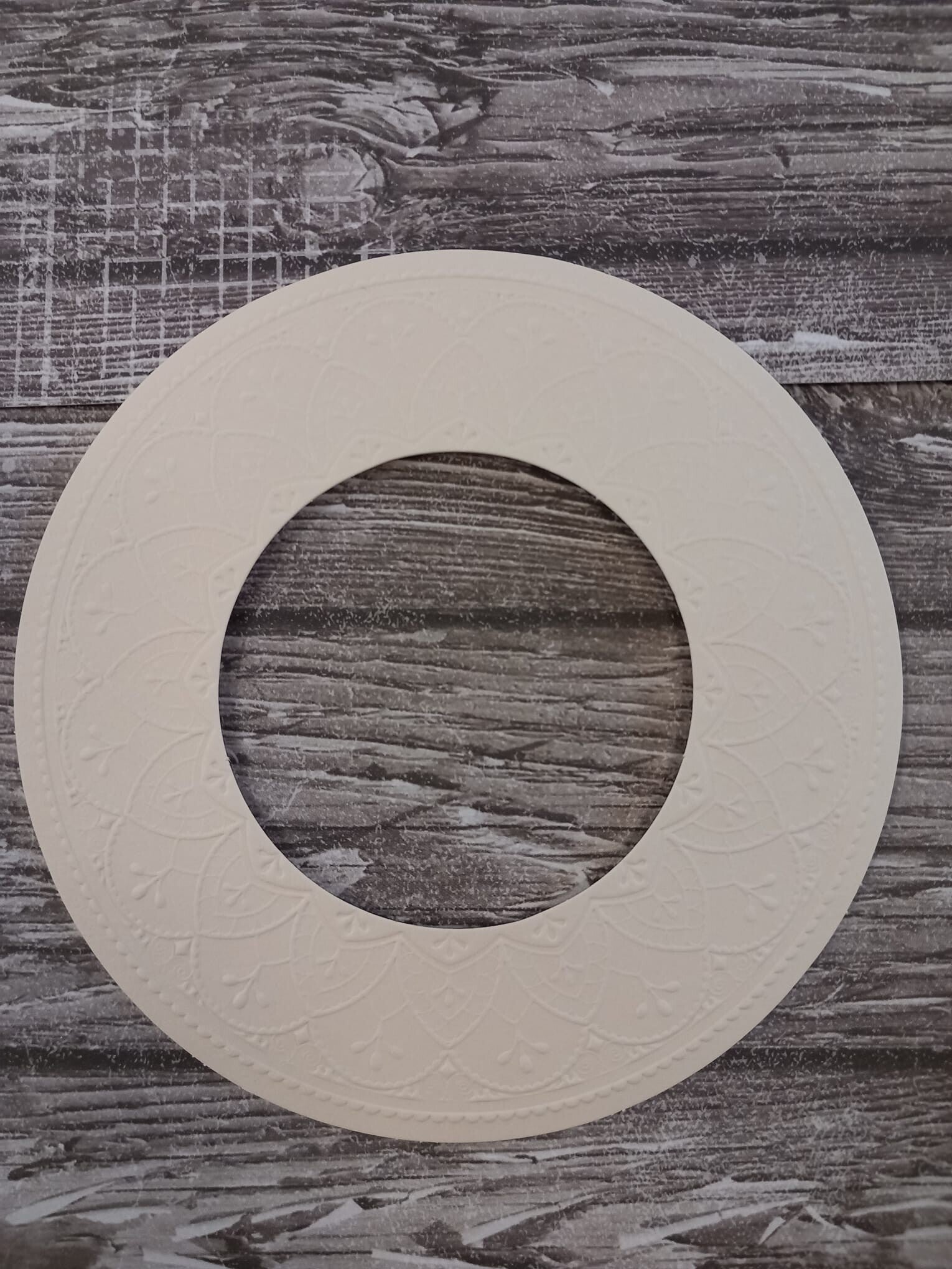creme cirkel oplegvellen - geëmbost