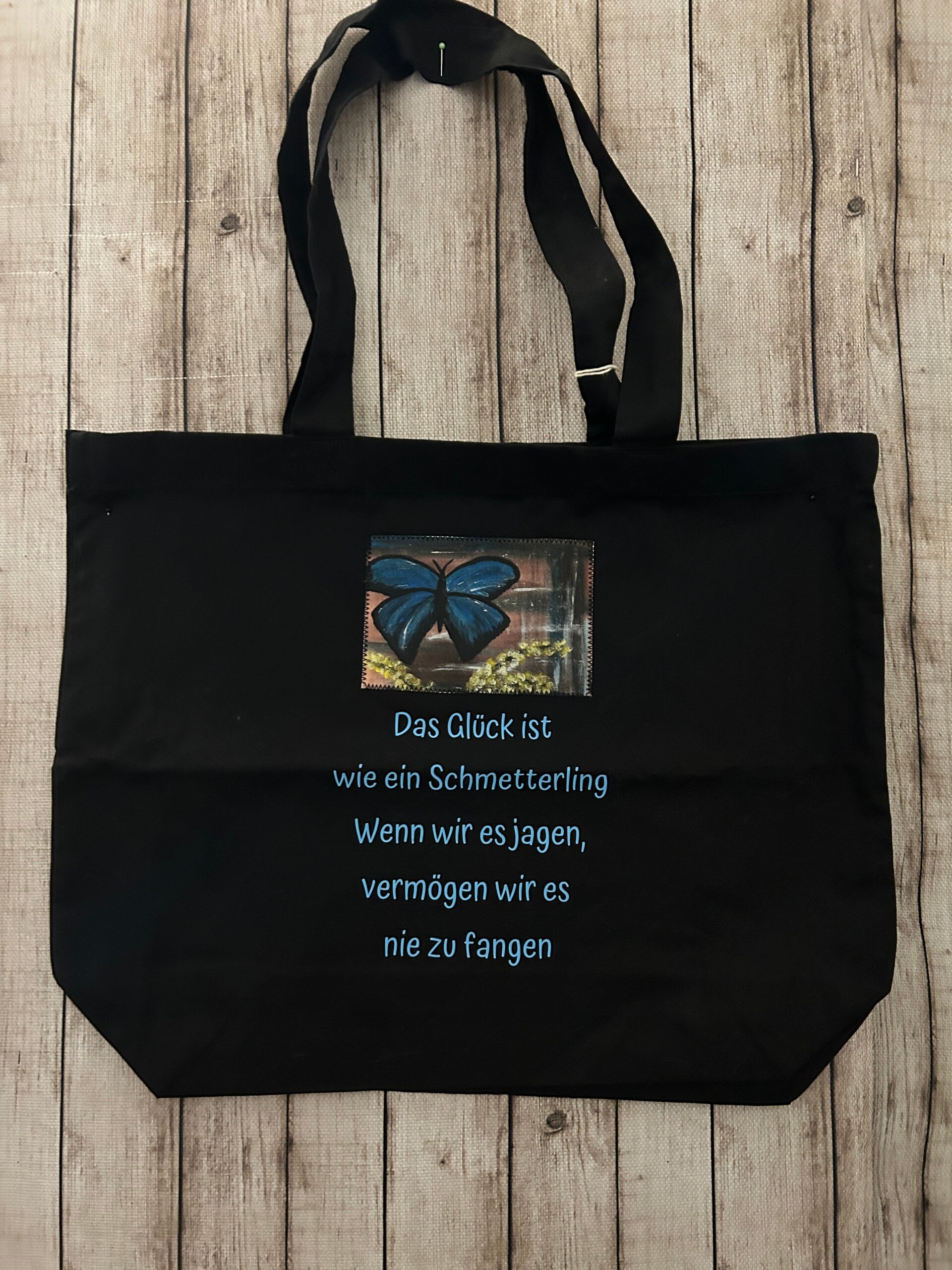 Baumwoll-Shopper „Das Glück ist wie ein Schmetterling“ – Schwarz