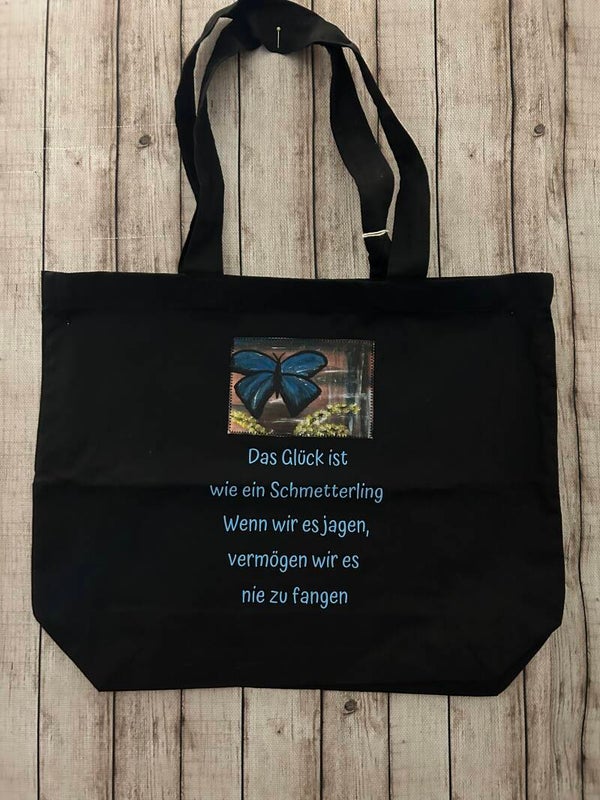 Baumwoll-Shopper „Das Glück ist wie ein Schmetterling“ – Schwarz