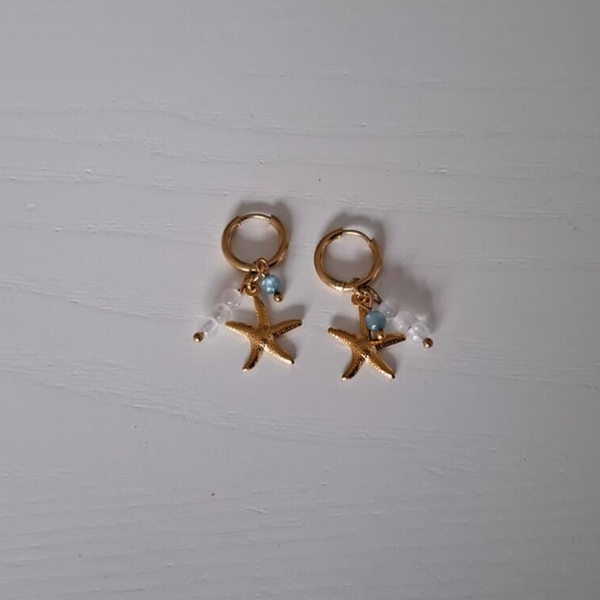 Zeester oorbellen goud blauw