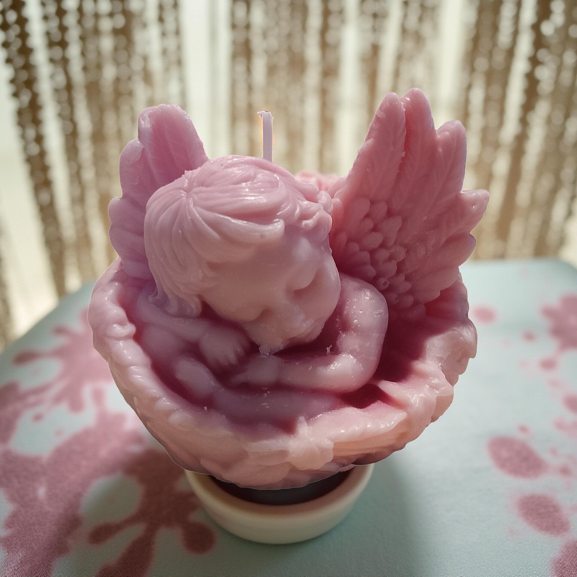 Angelo rosa che profuma di vaniglia