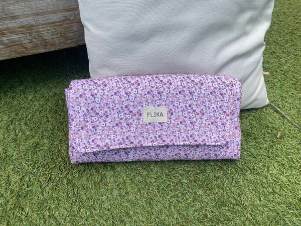 Cambiador flores rosas y moradas