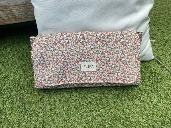 Cambiador flores beige-verdes-rojas