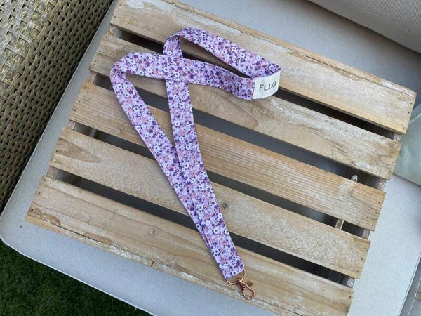 Yarda llavero flores moradas y rosas