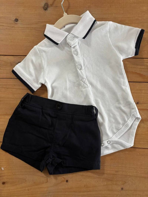 Polo Romper met korte broek.