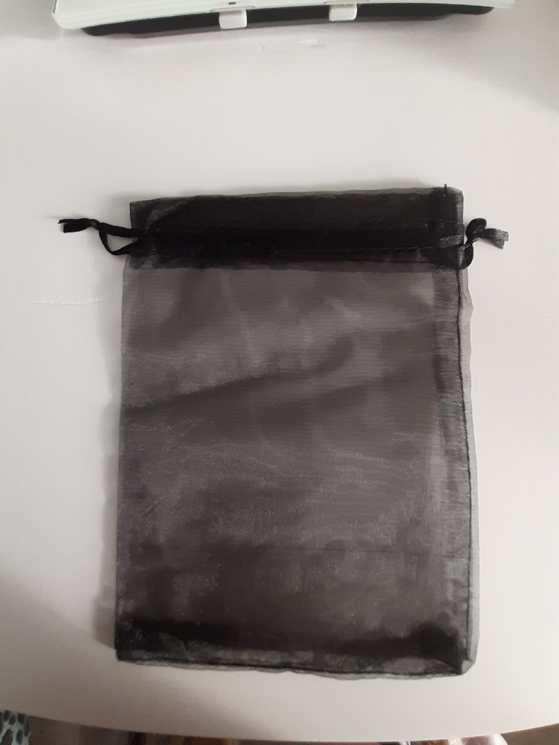 Zwart orangaza zakje