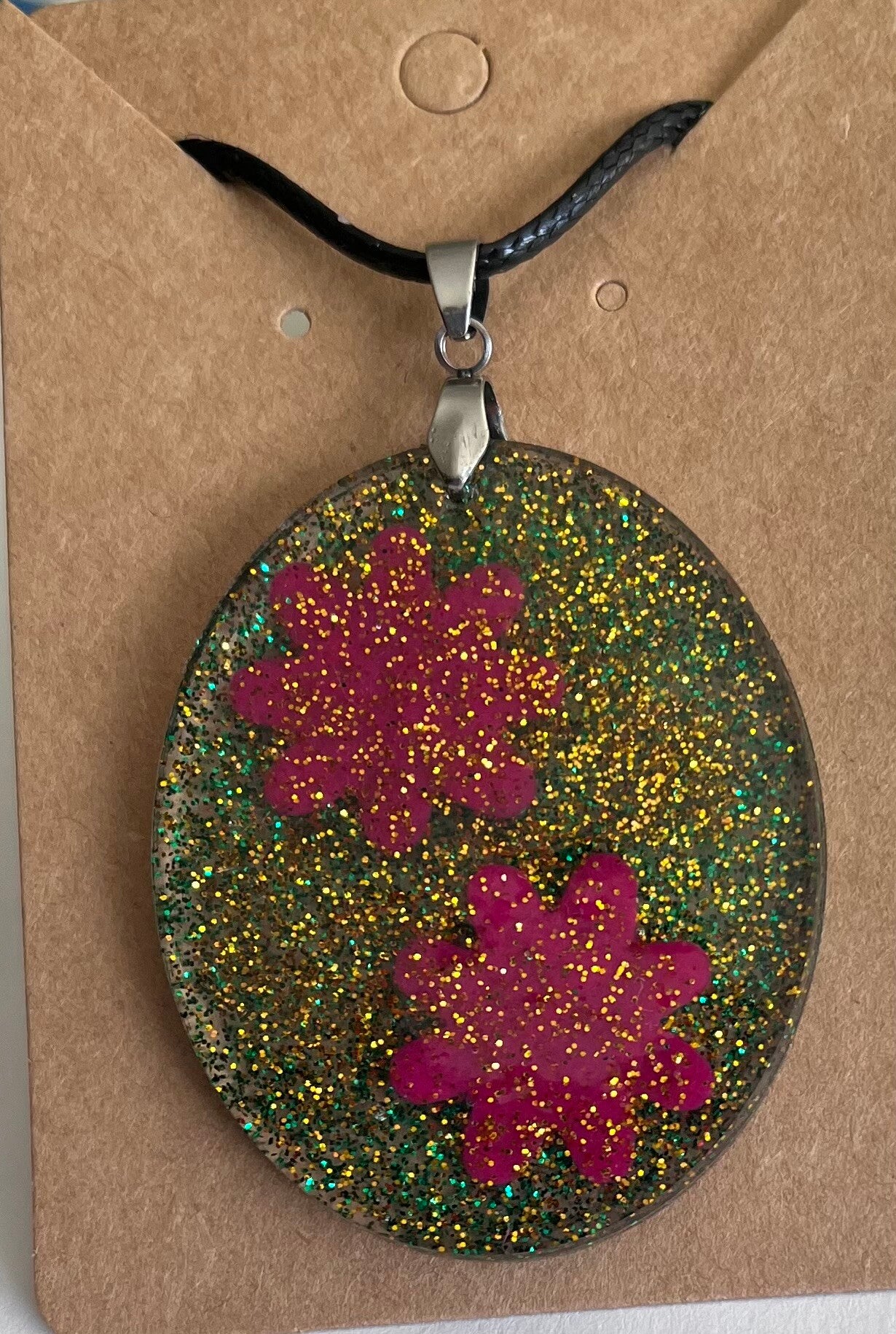 Pendentif fleurs rose