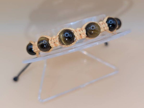Bracelet œil de tigre fil orange