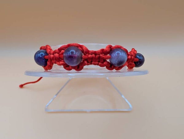 Bracelet rond améthyste fil rouge
