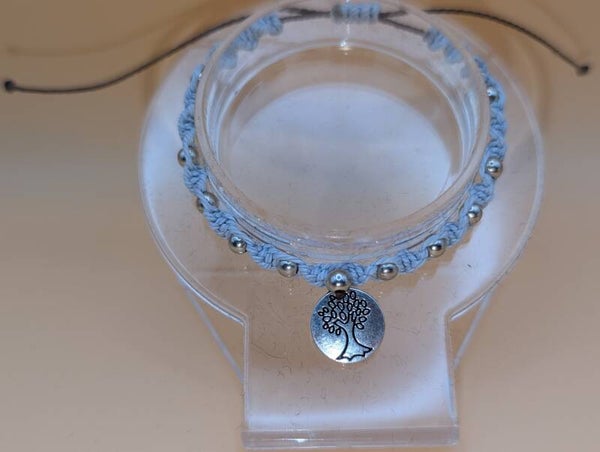 Bracelet torsade bleu ciel perles argentées insert arbre de vie