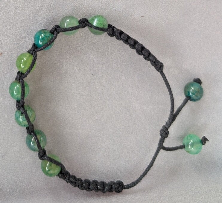 Bracelet veine de dragon jaune fil noir