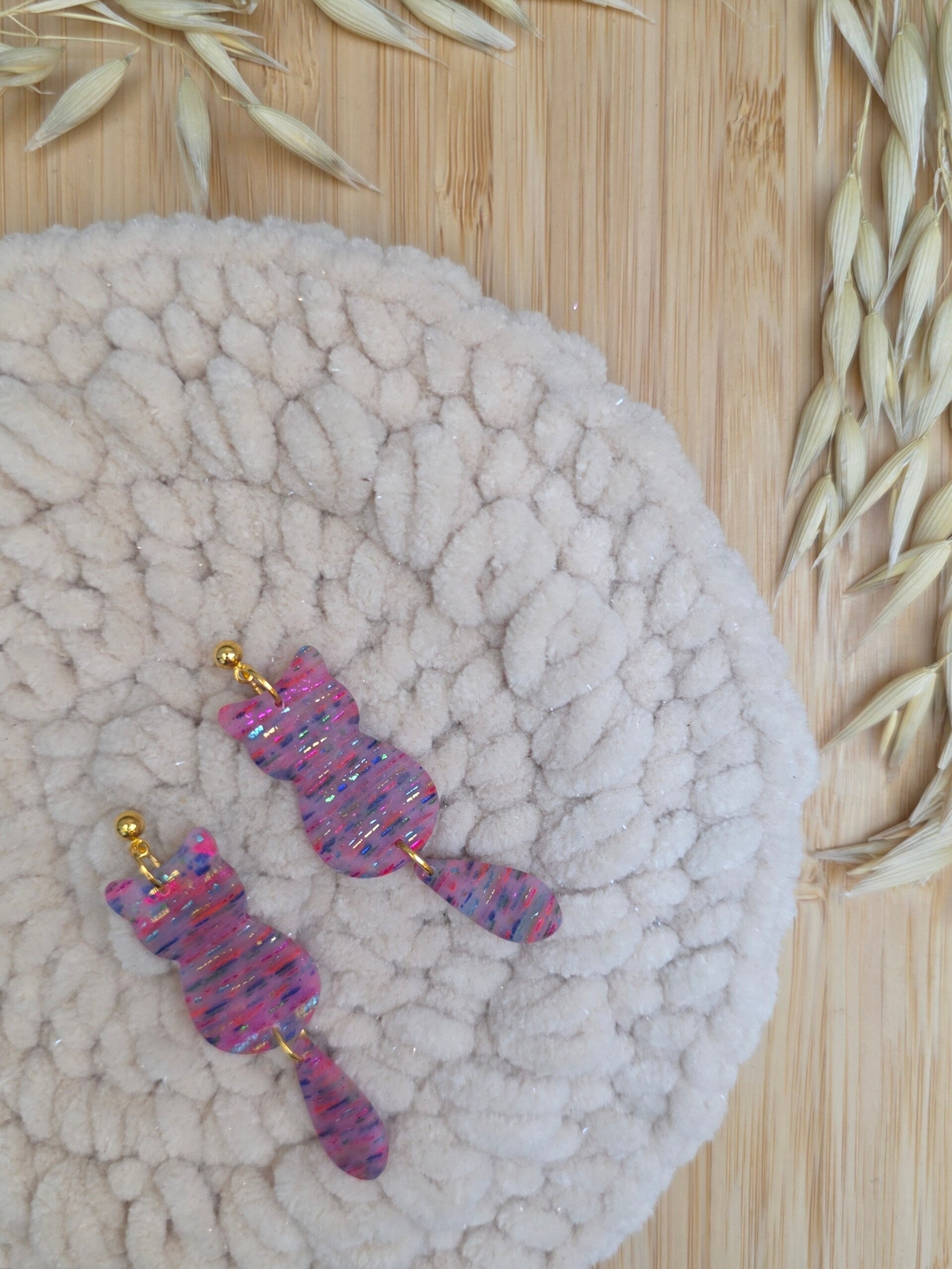 roze kattenoorbellen