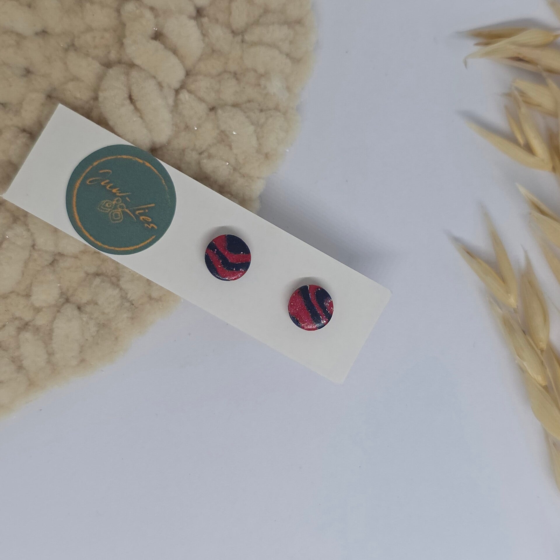 kleine blauw/roze oorstekers
