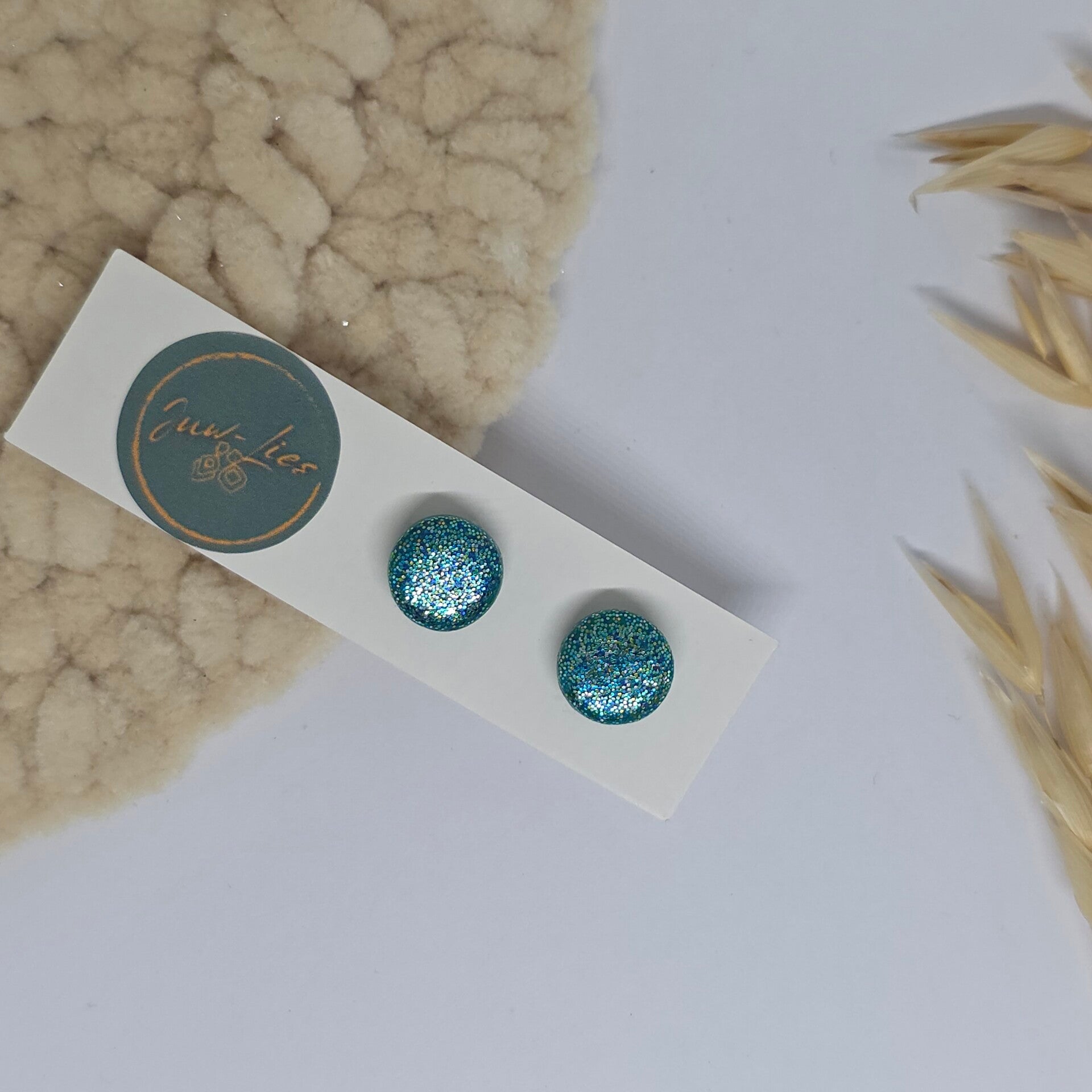 Oorstekers -  rond - blauw glitter