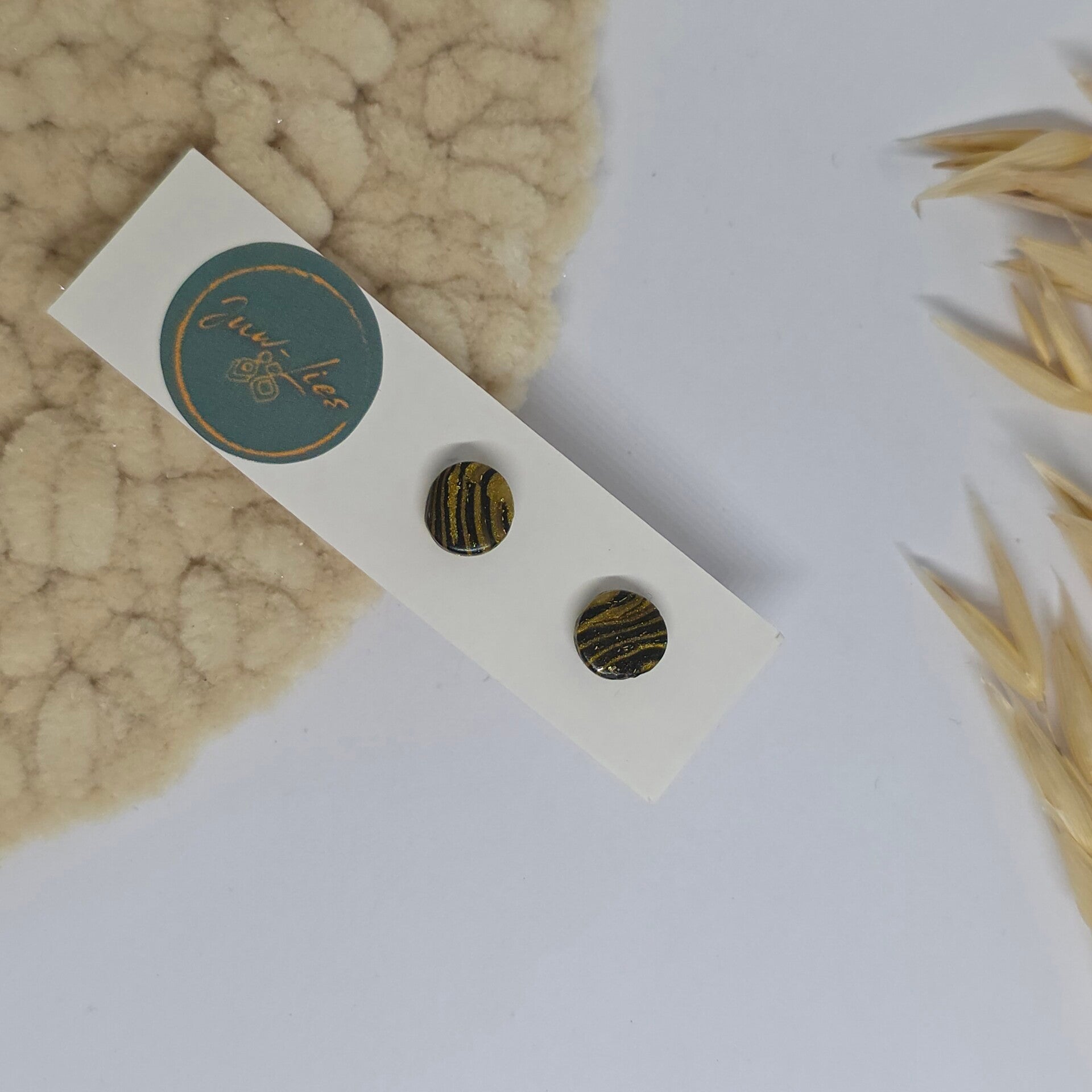 Kleine oorbellen - rond - zwart goud - gestreept