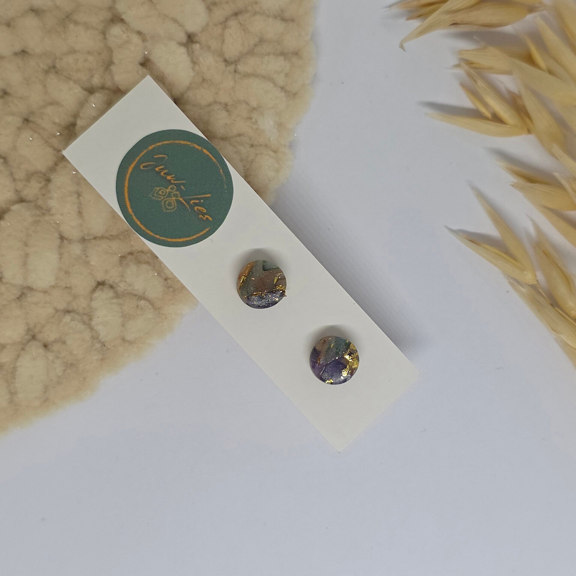 Kleine oorstekers - rond - paars goud - gemarmerd