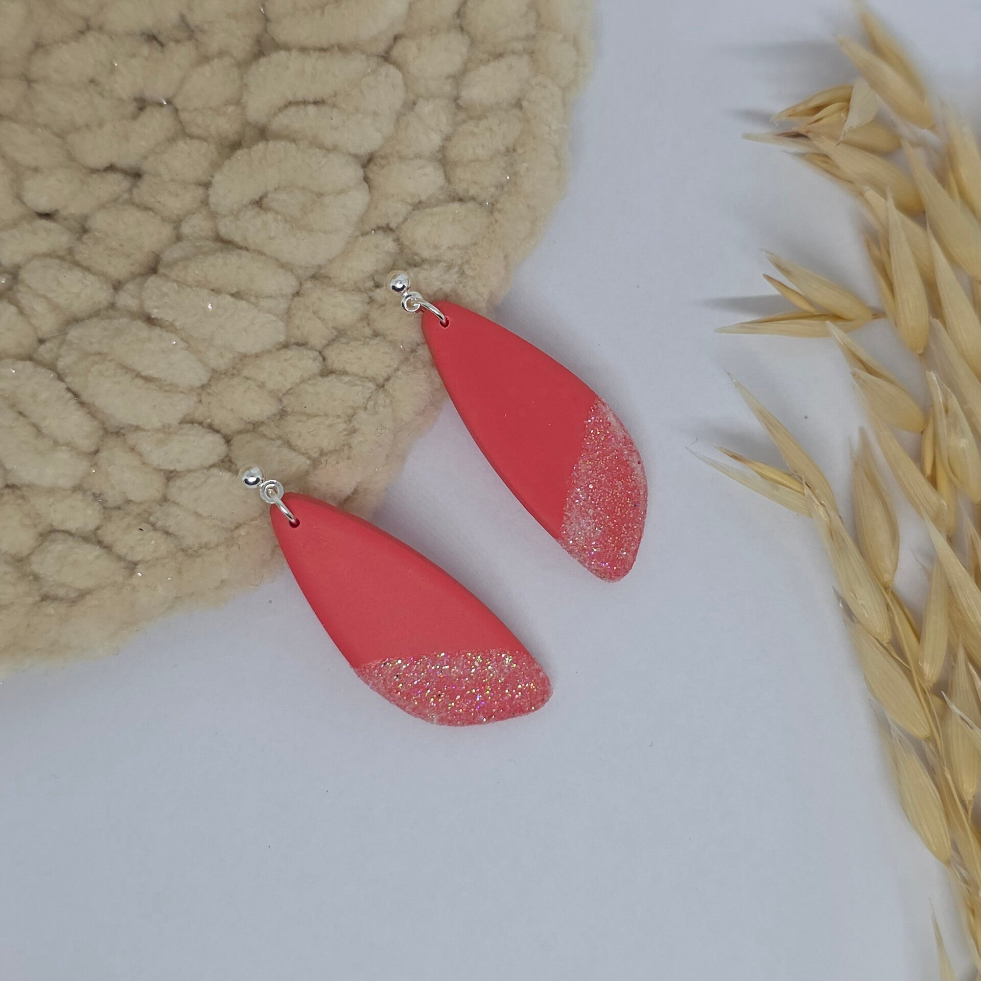 langwerpige roze oorbellen met glitter