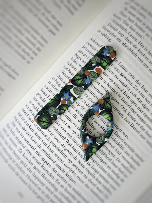 bladwijzer en duimhouder in bladpatroon