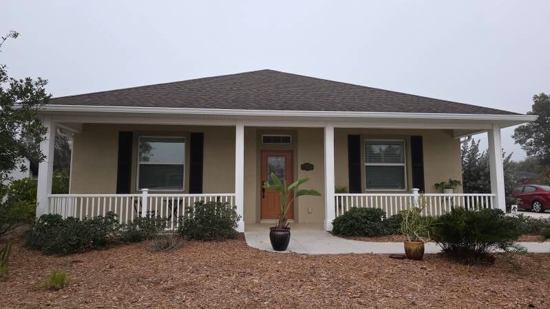 Before - Front View - Rotonda West Florida house exterior repaint Integrity Painting
