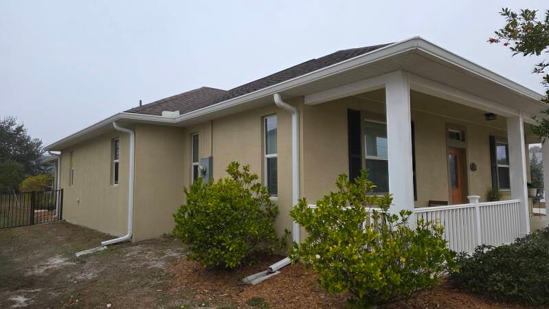 Before  Side View - Rotonda West Florida house exterior repaint Integrity Painting