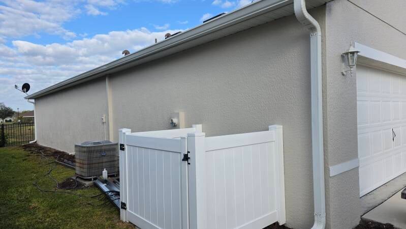 Side view - After exterior repaint Port Charlotte Florida home by Integrity Painting