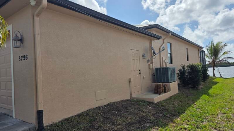 After Fresh exterior repaint Punta Gorda Florida home by Integrity Painting