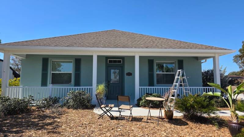 After - Front view - Rotonda West Florida house exterior repaint Integrity Painting