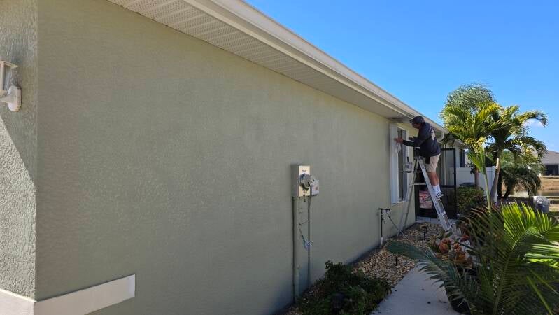 Before - Side view - Before and after exterior house painting Port Charlotte Florida