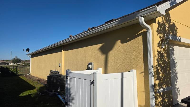 Side View - Before exterior repaint Port Charlotte Florida home by Integrity Painting