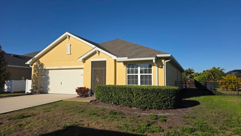 Before exterior repaint Port Charlotte Florida home by Integrity Painting