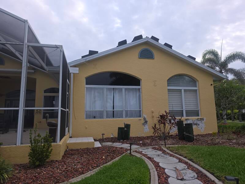 Before Rear View Professional exterior house painters Port Charlotte Florida Integrity Painting