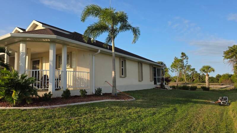 Before exterior repaint Punta Gorda Florida home