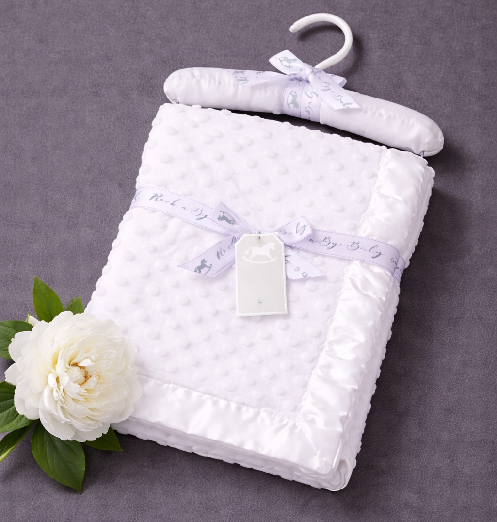 -Dimple Baby Blanket- With Satin Trim -on a satin padded hanger -White