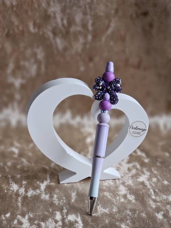 Stylo fantaisie noeud en strass violet
