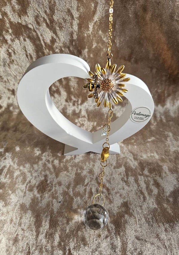 Attrape-soleil abeille qui butine