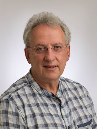 Bild zeigt Dr. Peter Glocker, Coach für positive Psychologie und Arzt mit Schwerpunkttätigkeit Psychosomatik