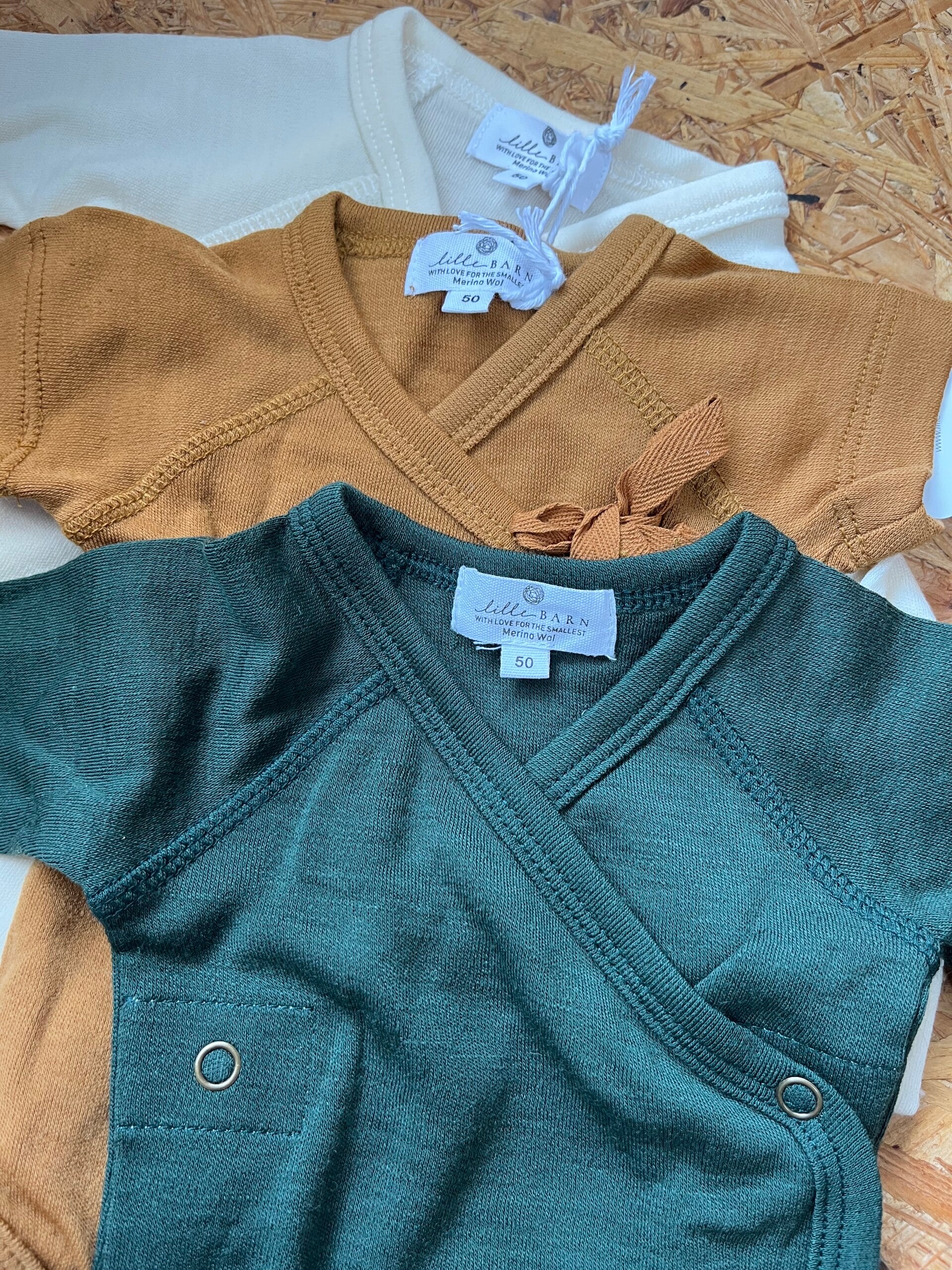 Merino overslagromper - Oker, ecru of donker groen