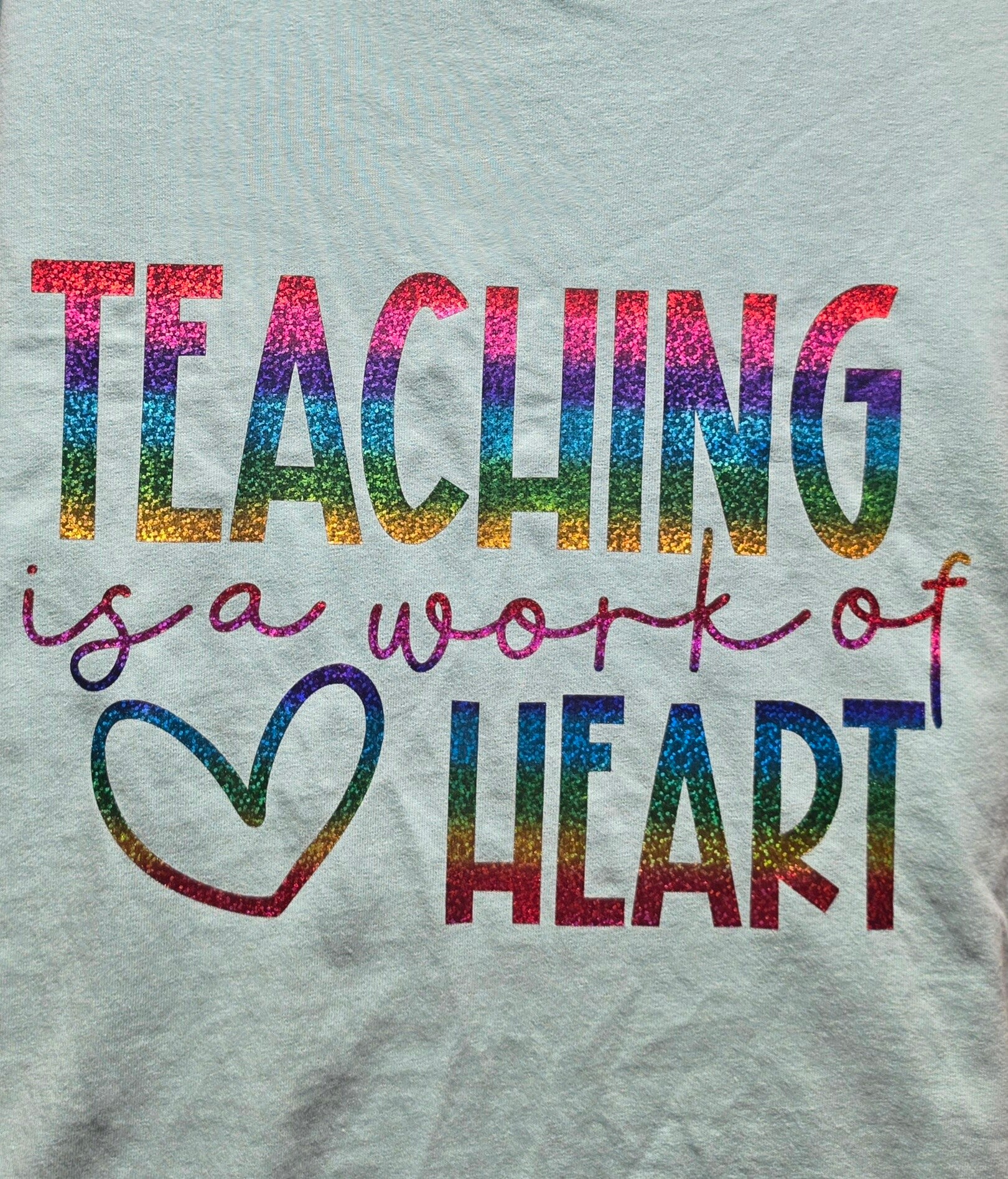"TEACHING IS A WORK OF HEART" T-SHIRT