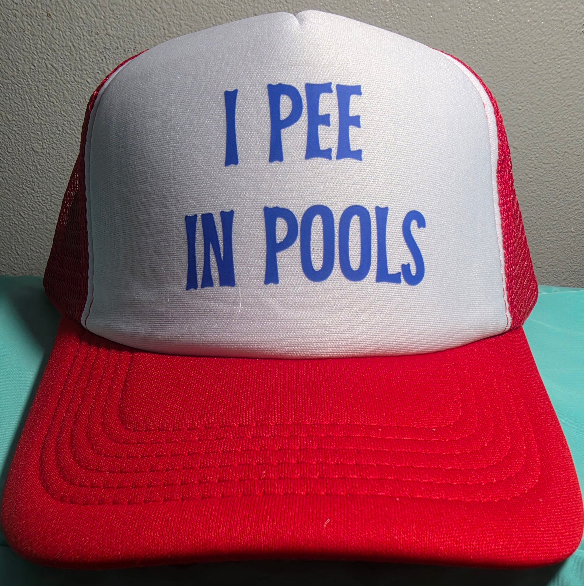 "I PEE IN POOLS" HAT